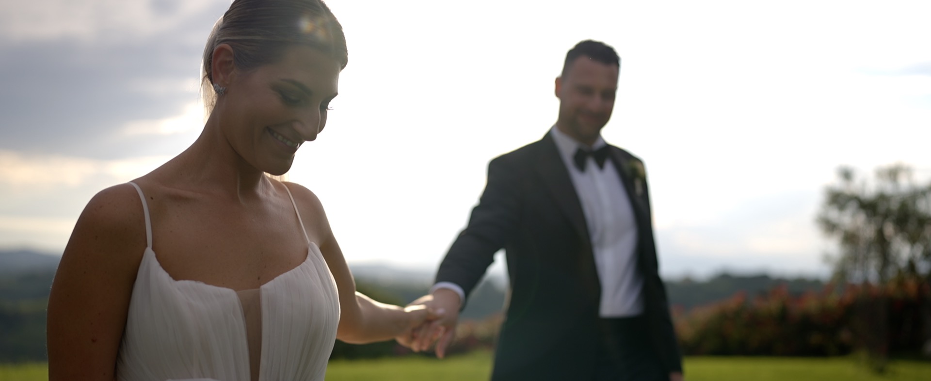 Bride and groom together in warm evening light