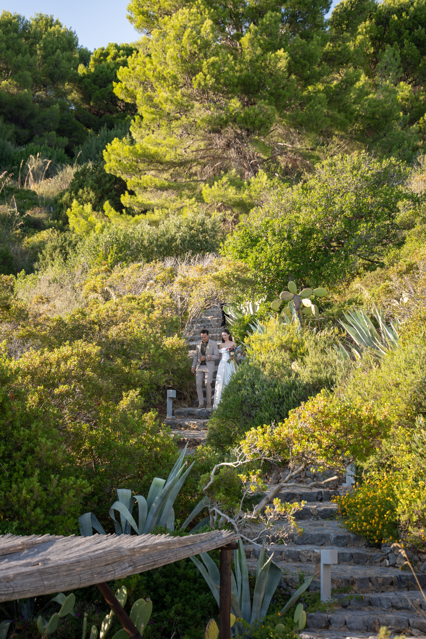 Jacob and Morane walking through the Mediterranean landscape