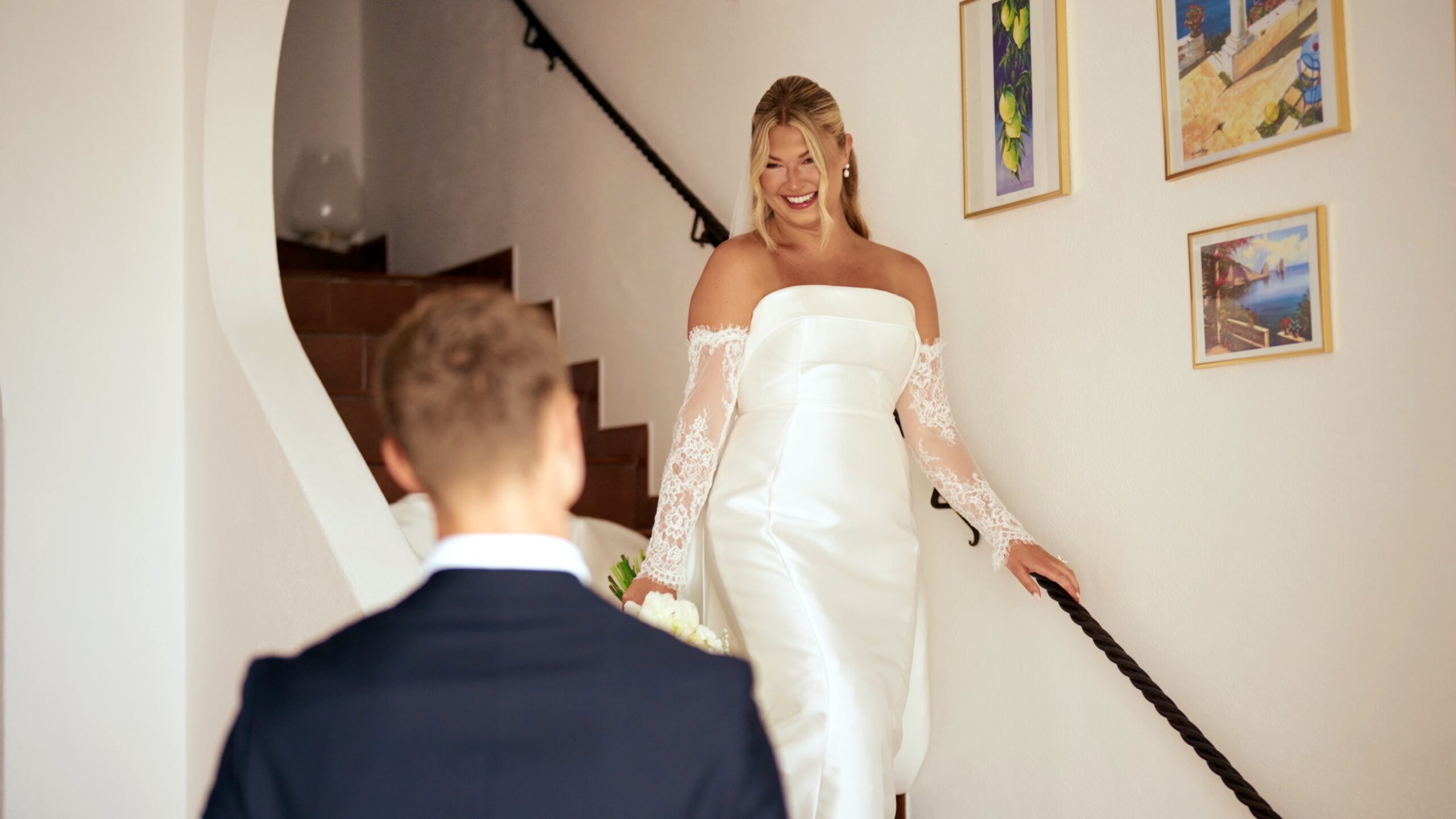 Newlyweds laughing together after their wedding ceremony