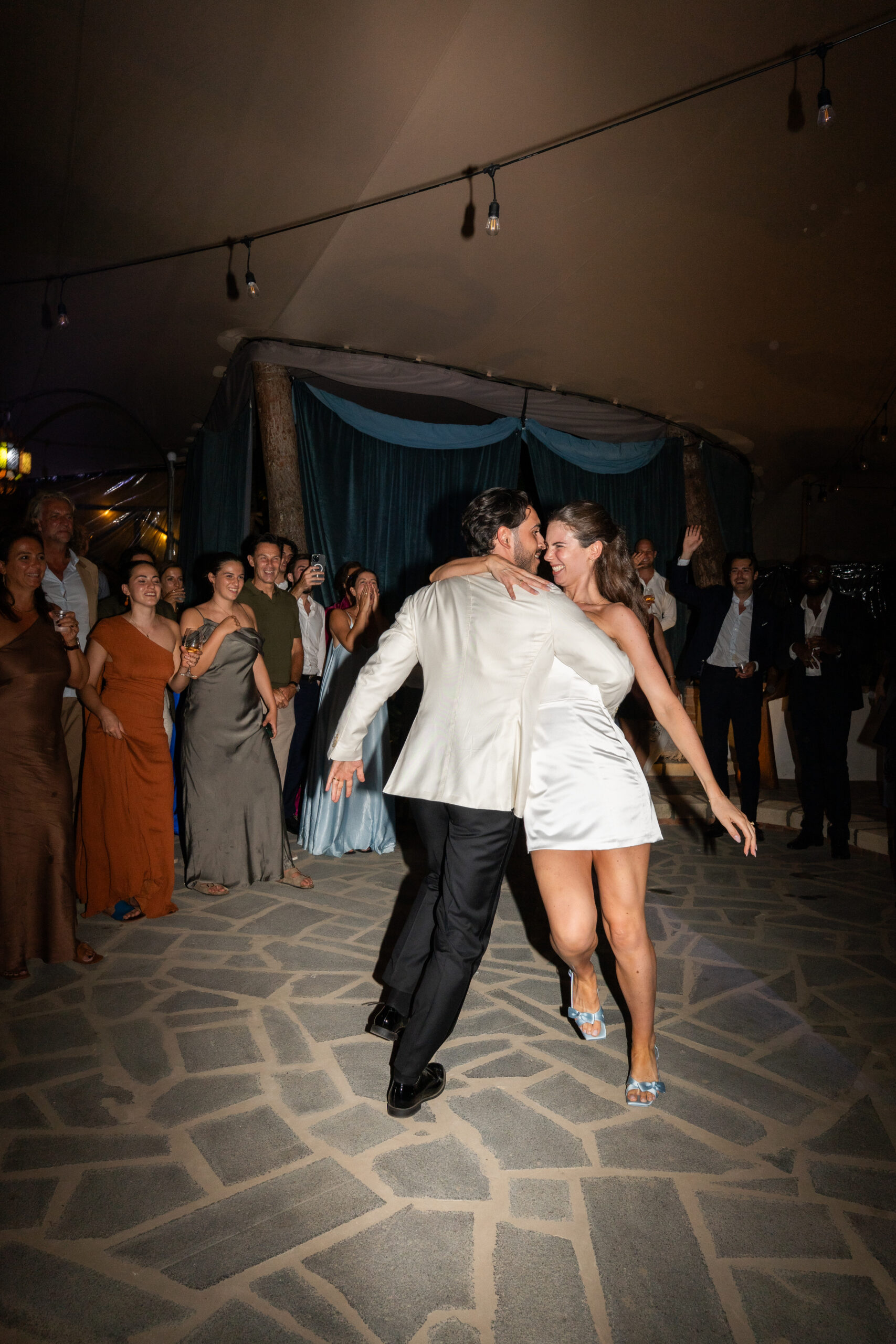 Jacob and Morane dancing with their wedding guests in Palinuro
