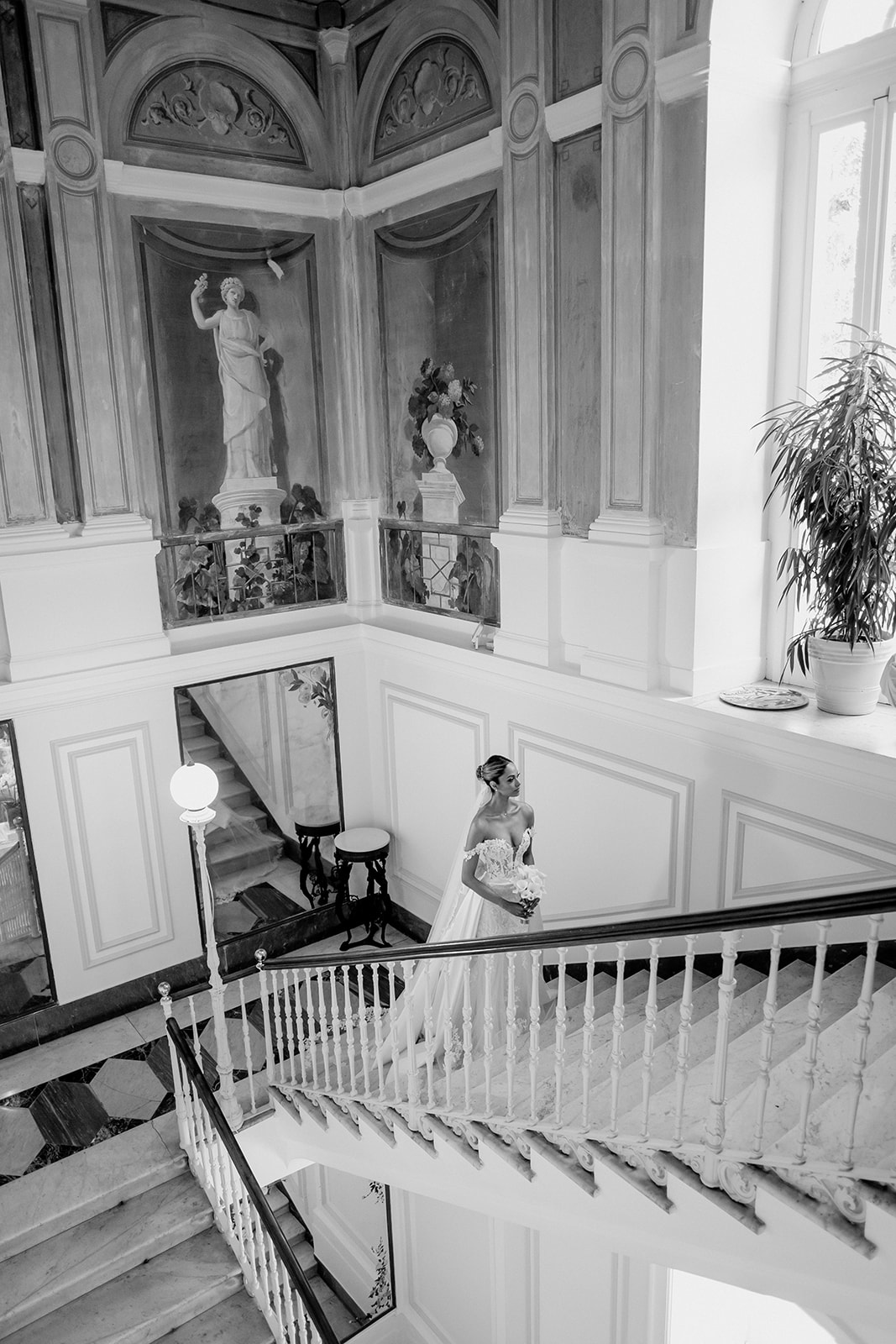 Black and white architectural photograph of the bride inside Bellevue Syrene