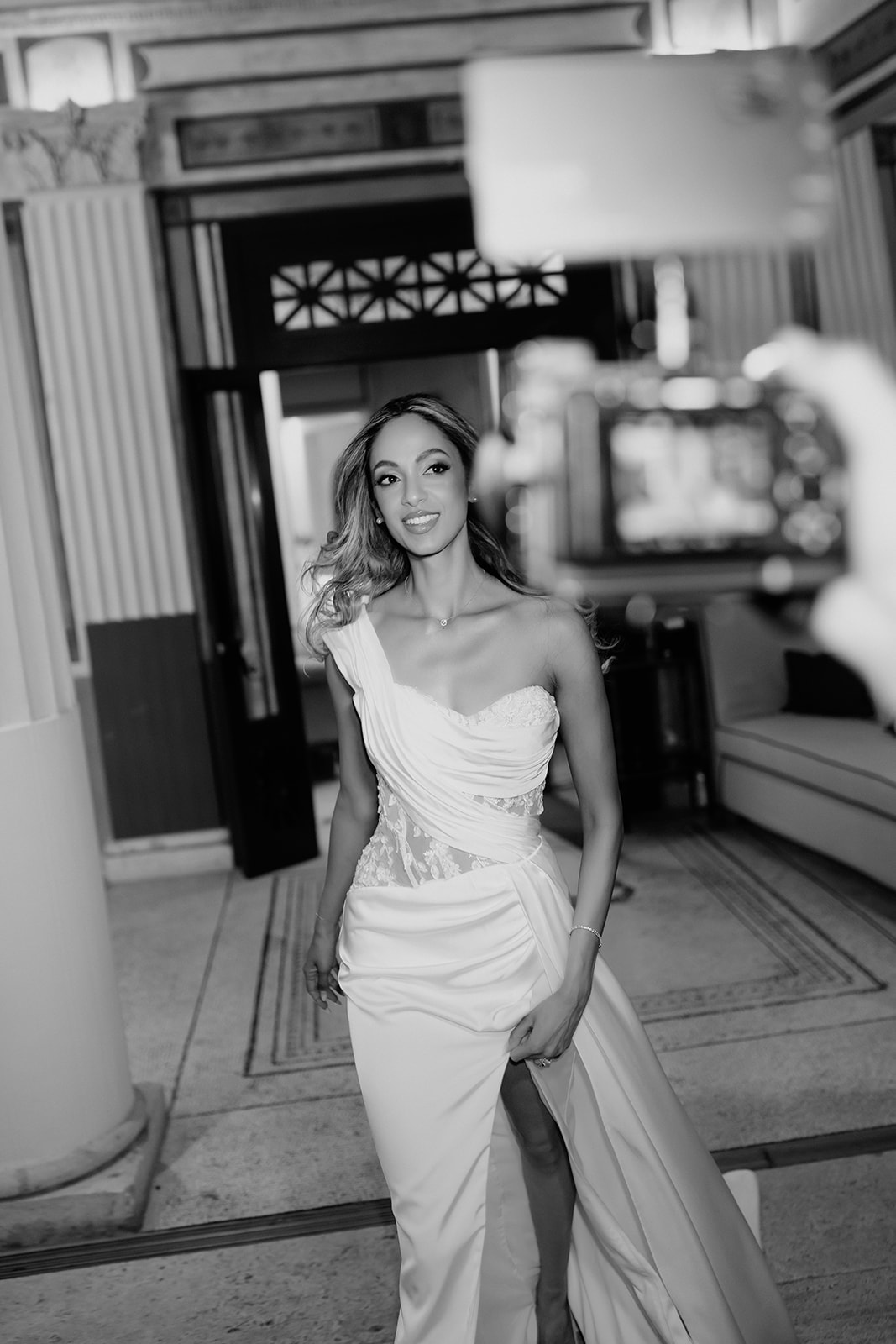 Black and white architectural photograph of the bride inside Bellevue Syrene
