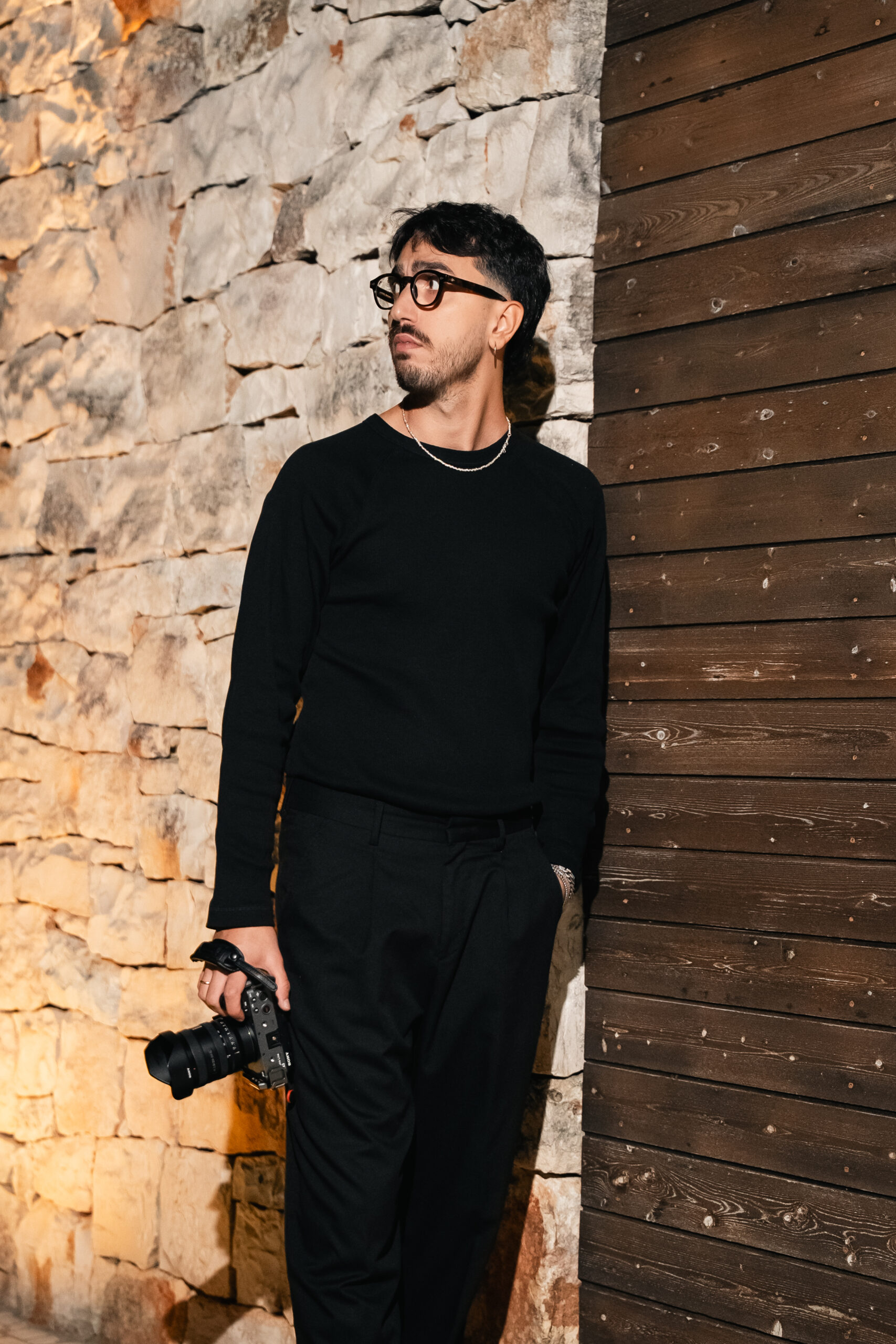 Luigi Rainone with his camera, looking towards the light