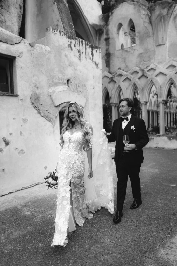 Laura and Koury walking through the historic cloister at Anantara Convento di Amalfi